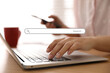 © New Africa - Search bar of website and woman working with laptop in office, closeup