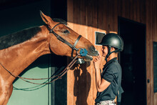 Female Professional Rider Bonding With Her Horse - Thoroughbred Connecting And Smiling To Her Human Partner