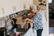 © Johnér - Senior woman in kitchen