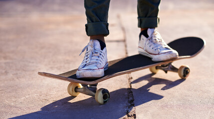 Canvas Print - These sneakers were made for skating. A cropped shot of a woman standing on a skateboard.