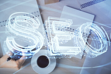 Aufkleber - Double exposure of woman's hands making notes with SEO icon. Concept of Search engine optimization