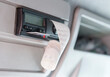 © vlad - Close-up of a digital tachograph with a driver card ejected and drive times printed. Ending the shift.