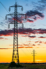 Wall Mural - Detail of electric pole with electric cables at sunset