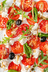 Sticker - caprese salad with arugula, top view