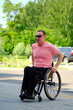 © Alex - Portrait of a man with disability in a wheelchair, vertical view