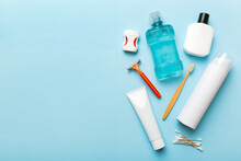 Composition With Bath Cosmetics On Table. Razor, Toothpaste, Soap, Gel, Toothbrush, Mouthwash And Other Various Accessories. Cosmetics For Skin Health. Bath Mockup For Your Logo