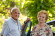 © carballo - senior couple traveling by car