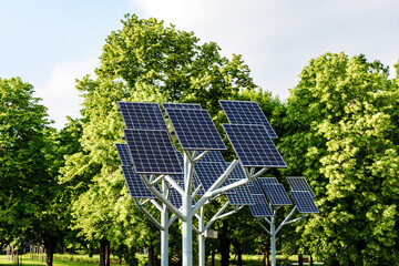 Photovoltaic solar power panels in city park.