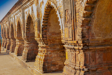 Wall Mural - Arches of Rasmancha, oldest brick temple of India -tourist attraction in Bishnupur, West Bengal, India. Terracotta-burnt clay-structure is unique. Hindu deities were worshipped here in Ras festival.