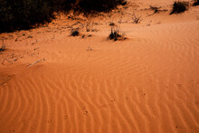 Ripples In Red Desert Sand