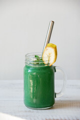 Wall Mural - smoothie mug with spirulina and banana