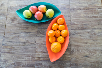 Wall Mural - Organic Apples oranges and mandarins in trays