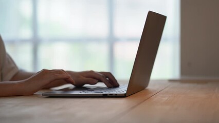 business woman sitting using laptop computer with on the desk in the office.