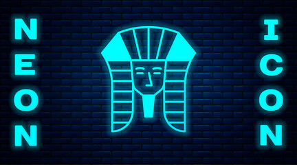 Wall Mural - glowing neon egyptian pharaoh icon isolated on brick wall background. vector