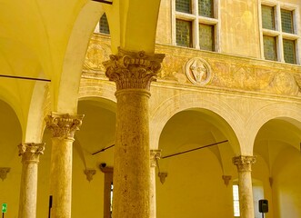 Wall Mural - arches of the cathedral in Pienza