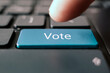 © diy13 - the concept of electronic voting in elections. Voice of the people - means the opinion of the majority of the people, text concept button on keyboard