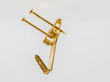 close up floating image of a double fixing single hook brass  metal wall mounted picture hook