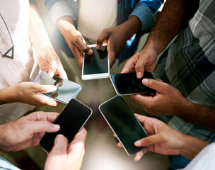 Poster - Just press send. Cropped shot of a group of colleagues using their cellphone while standing in a circle.