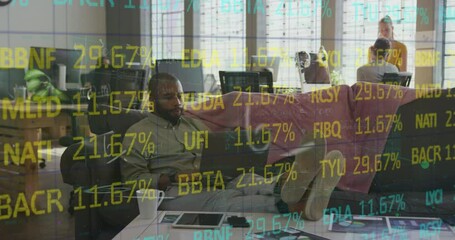 Poster - Animation of data processing over african american businessman using laptop in office