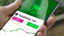 Invest In Nasdaq ETF, An Investor Buys Or Sell An Etf NASDAQ 100 Fund.