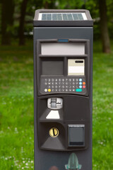 Wall Mural - Parking meter outdoors, closeup view. Modern device