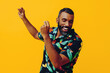 canvas print picture - close up handsome bearded mid adult african american man smiling and dancing wearing Hawaiian shirt on vacation studio shot