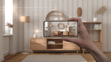Wall Mural - hand holding smart phone, ar application, simulate furniture and interior design products in real ho