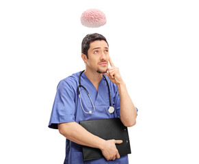 Sticker - Young doctor holding a clipboard and thinking with brain above his head