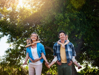 Sticker - Family, the greatest love of life. Shot of a happy family spending time together outdoors.