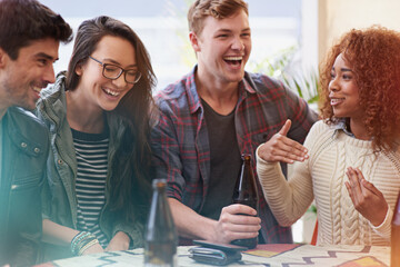 Canvas Print - She always tells the best stories. Cropped shot of a group of friends drinking outdoors.