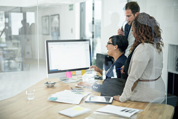Aufkleber - Getting a second and third opinion. Cropped shot of three colleagues working in the office.