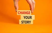 Change Your Story Symbol. Concept Words Change Your Story On Wooden Blocks On A Beautiful Orange Table Orange Background. Businessman Hand. Business Finacial And Change Your Story Concept. Copy Space.