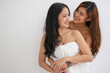 © PHAISITSAWAN - lgbtq, lgbt concept, homosexuality, two beautiful women showing their love to each other in a very warm home happily
