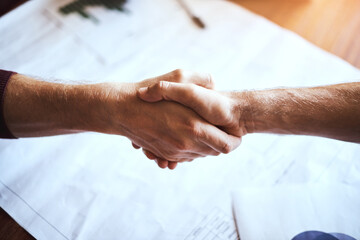 Poster - The deal is sealed. Cropped shot of two unrecognizable businessmen shaking hands.