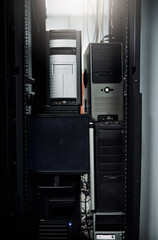Poster - The hardware behind a solid computer network. Cropped shot of industrial computers in the server room of a data center.
