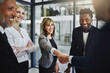 © Delmaine Donson/peopleimages.com - Partnering together to achieve their greatest success yet. Cropped shot of businesspeople shaking hands in an office.