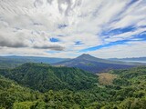 Fototapeta Konie - volcano landscape with clouds