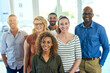© Tamani Chithambo/peopleimages.com - We are always optimistic and motivated. Shot of a group cheerful friends posing for a portrait while standing inside of a building.