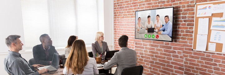 Poster - Business Team Having Video Conference