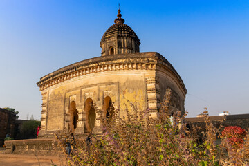 Wall Mural - Famous terracotta (fired clay of a brownish-red colour, used as ornamental building material) artworks at Lalji Temple, Bishnupur, West Bengal, India. It is popular UNESCO heritage site of India.