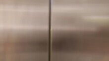 Slow Motion VDO 4K. Asian Woman People Standing In Modern Elevator At Modern Business Center Building.