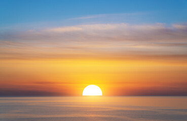 Wall Mural - big sun and sea sunset background