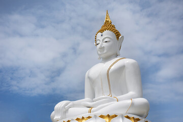 Beautiful white ancient buddha statue for thai people and foreign travelers travel visit and respect praying and blessing wish holy mystery worship at Wat khien or Khian temple in Nonthaburi, Thailand