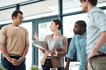 Poster - Generating new ideas to boost the growth of their business. Shot of a group of businesspeople having a discussion in an office.