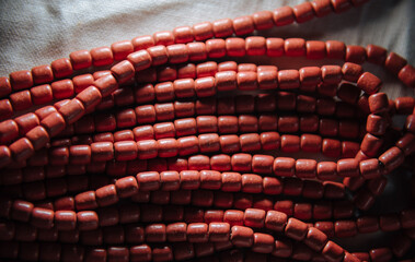 Wall Mural - ethnic necklaces of red colors close up