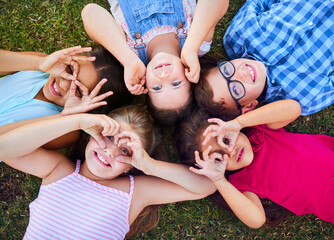 Sticker - Children see magic because they look for it. Shot of a group of elementary school children together.