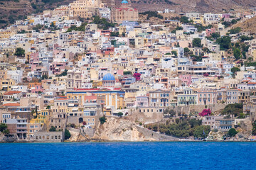 Wall Mural - ermoupolis town, greece. a town on the side of a mountain. houses and streets in greek architecture.