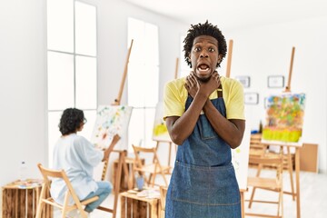 Poster - African young man standing at art studio shouting and suffocate because painful strangle. health problem. asphyxiate and suicide concept.