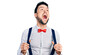 © Krakenimages.com - Hispanic man with beard wearing hipster look holding suspenders angry and mad screaming frustrated and furious, shouting with anger looking up.