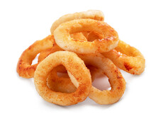 Deep Fried Onion Rings On A White Plate With Seasonings Isolated On A White Background